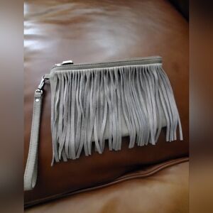 PRÜNE Wristlet Argentinean Leather Handbag with fringe